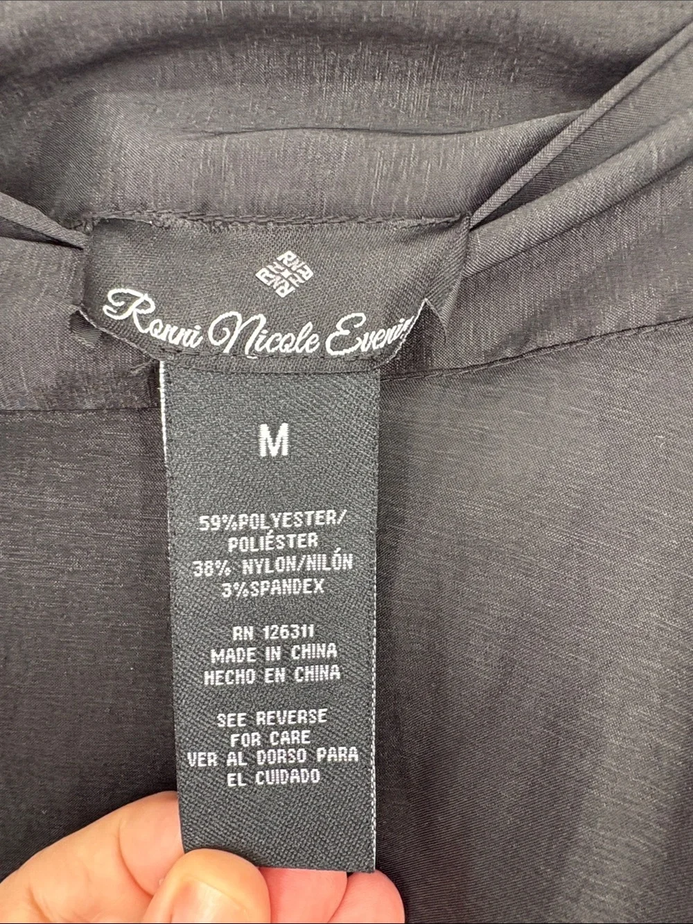 Ronni Nicole sleek black
